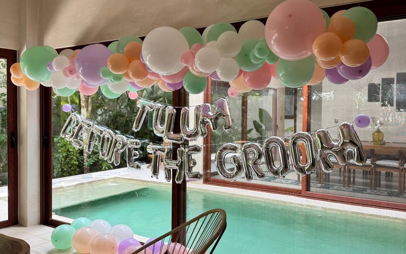 Festive villa setup with floral arrangements and table decor