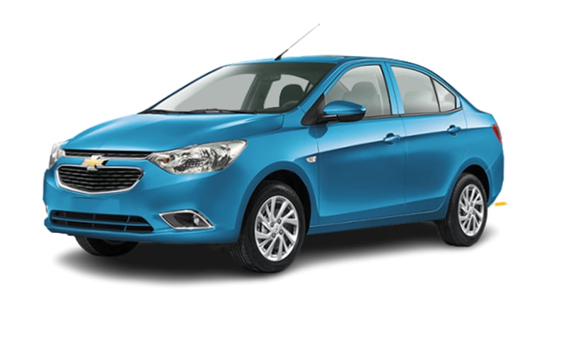 Silver Chevrolet sedan available for rental